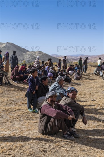 Spectators at traditional Buzkashi game