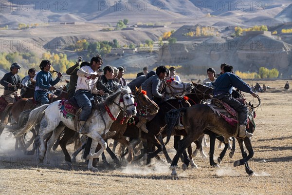 Men practising a traditional Buzkashi game