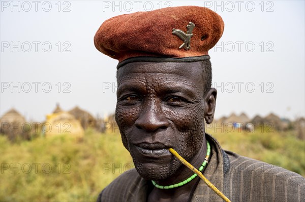 Scar face as a mark of beauty man from the Jiye tribe