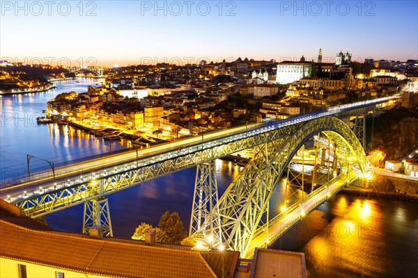 Porto with bridge Ponte Dom Luis I over river Douro night evening travel city in Porto
