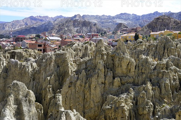 Homes behind the bizarre rock formations in the Valle de la Luna