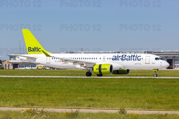 An Air Baltic Airbus A220-300 with registration number YL-AAO at Stuttgart Airport