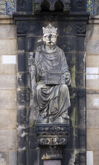 Sculpture of Charlemagne on the facade of St. Peter's Cathedral