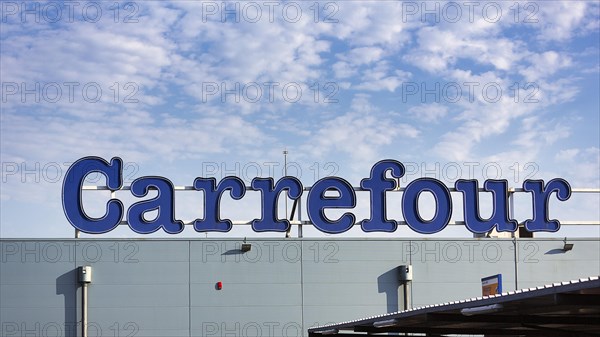 Carrefour lettering on a roof