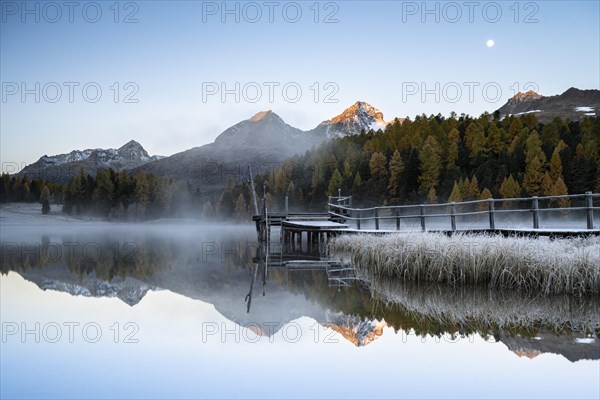 Mountain peaks reflected in Lake Staz