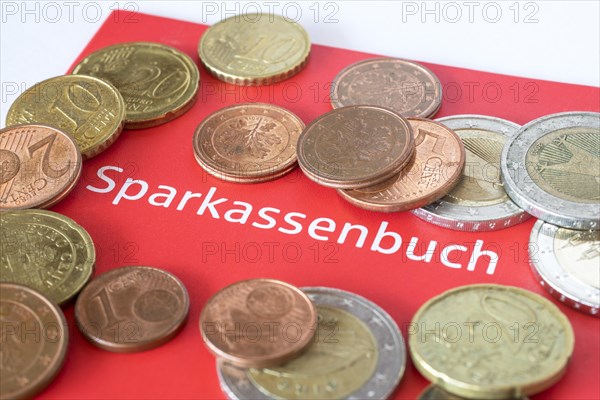 Savings bank book with small change