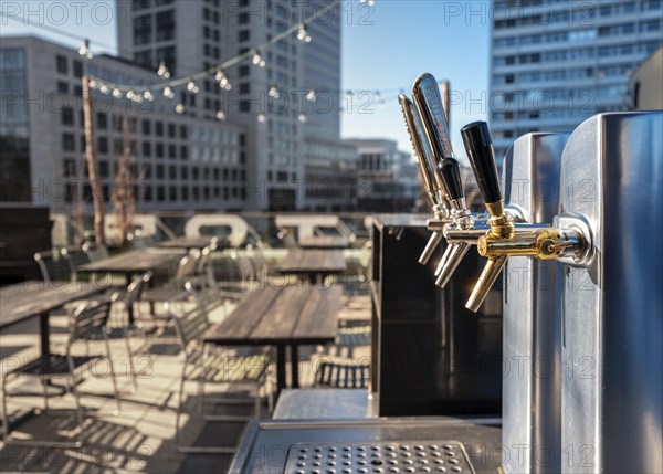 Taps of a bar on the terrace of the Bikini Haus