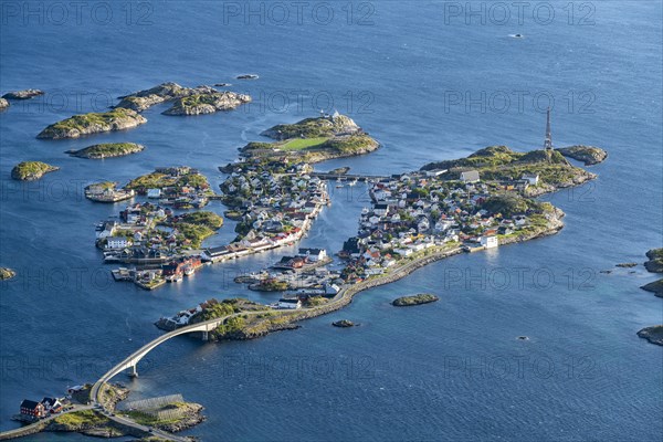 View of fishing village Henningsvaer from the top of Festvagtinden