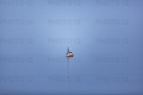 Fishing vessel alone at sea