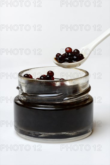 Aceto pearls in glass and spoon
