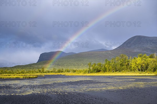 Rainbow in thunderstorm mood