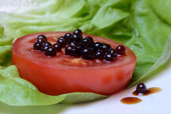 Aceto pearls on tomato