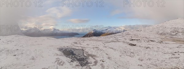 Hiking trail in the first snow at Brosmetinden