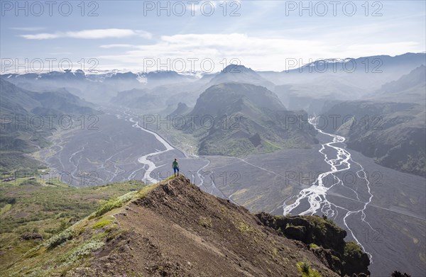 Hiker looking over landscape
