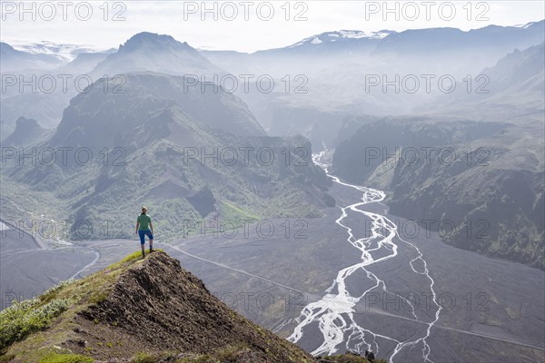 Hiker looking over landscape