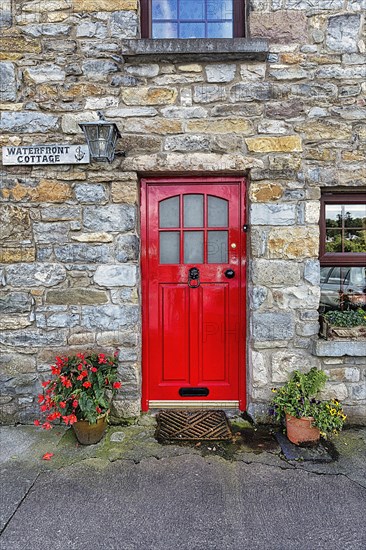 Red door in a stone house