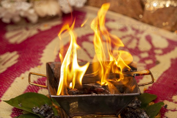 Close up of the offerings of Yajna at a Hindu wedding in Beau-Bassin