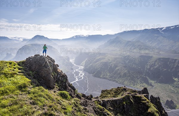 Hiker looking over landscape