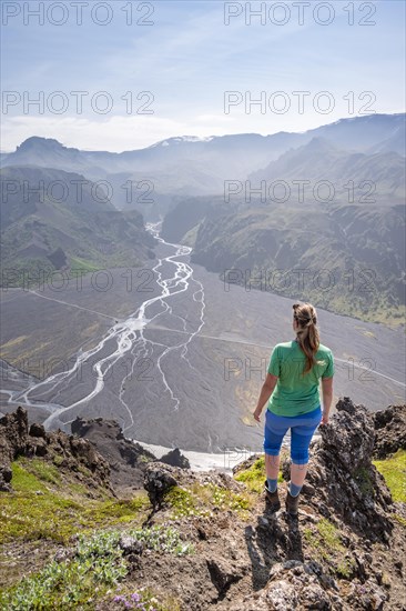 Hiker looking over landscape
