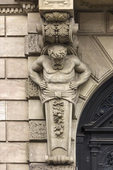Atlant on a house in neo-Renaissance style