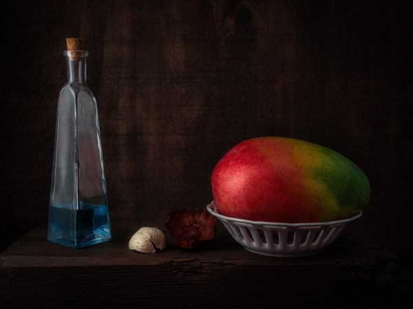 Still Life with Mango in Ceramic Basket