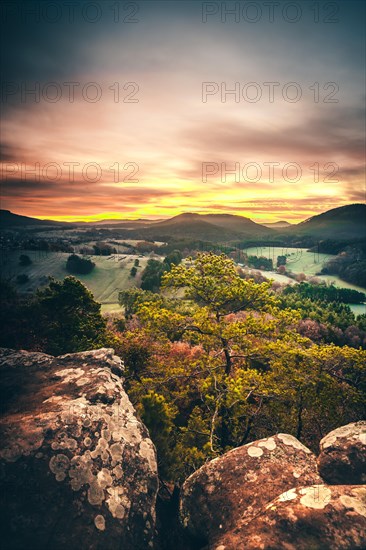 View from the sandstone rock Wachtfelsen to the sunrise