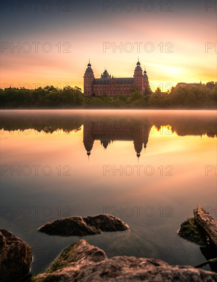 Johannisburg Castle reflected in the Main River