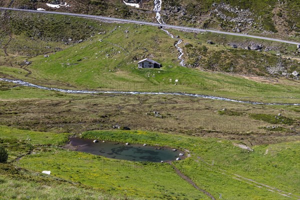 Small mountain lake near Tschuggen and Saess hut