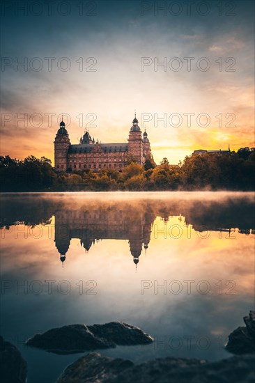 Johannisburg Castle reflected in the Main River