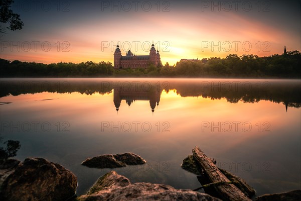 Johannisburg Castle reflected in the Main River