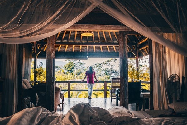 View from a four-poster bed into the morning atmosphere