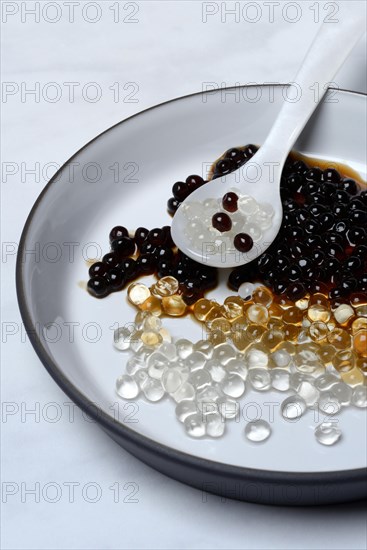 Aceto pearls with spoon in bowl