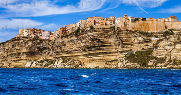 Steep coast of Bonifacio with old town on a limestone plateau