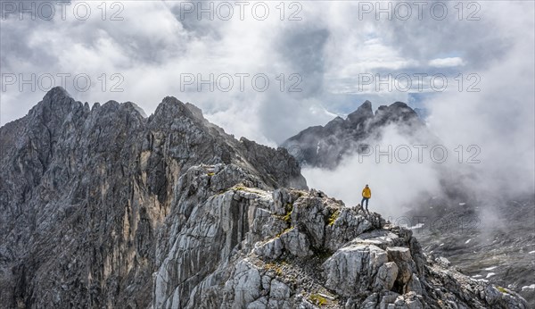 Hiker at the summit of the Westliche Toerlspitze