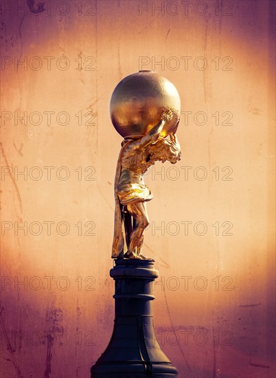 Gilded Atlas statue on the roof of Potsdam's Old Town Hall