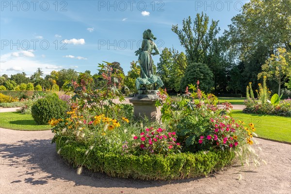 Statue of Lison with geese in the park of the orangery in Strasbourg