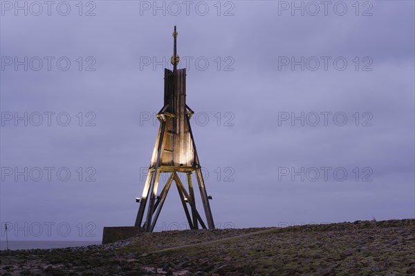 Illuminated Kugelbake at blue hour