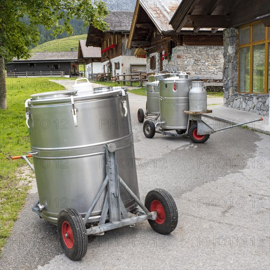 Milk tanks waiting to be emptied in front of the Eng-Alm cheese dairy