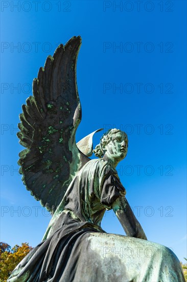 Bronze angel in front of the Orangery Palace in Sanssouci Park