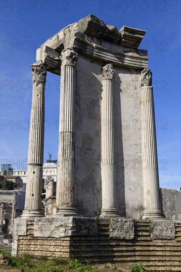 Partially restored historic cella of Temple of the Vesta on brick foundation wall