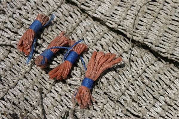 Fishing net with red stoppers