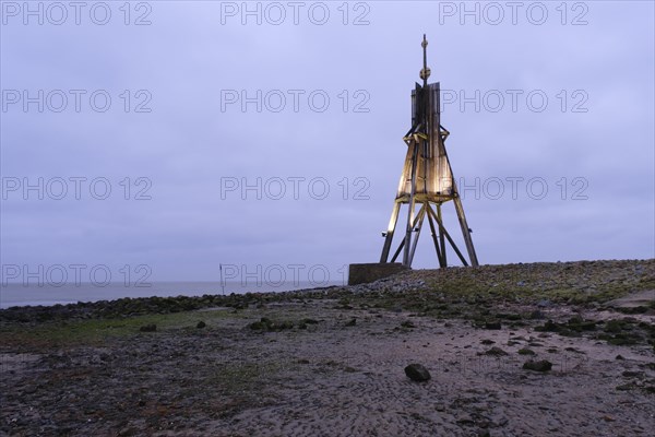 Illuminated Kugelbake at blue hour