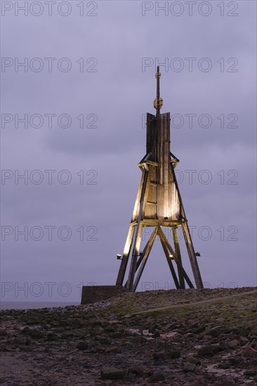 Illuminated Kugelbake at blue hour