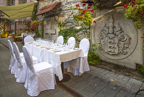 Festively set table in Old Town courtyard