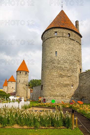Medieval city fortification with battlements and defence towers