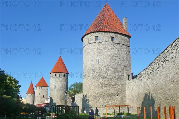 Medieval city fortification with battlements and defence towers