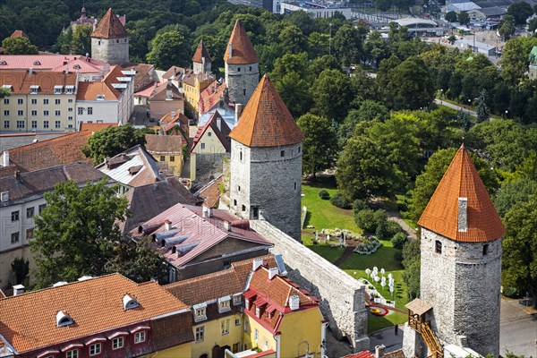 Medieval city fortification with battlements and defence towers
