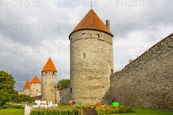 Medieval city fortification with battlements and defence towers
