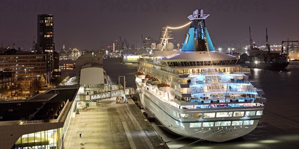 Hamburg Cruise Center Altona with the cruise ship Artania at night