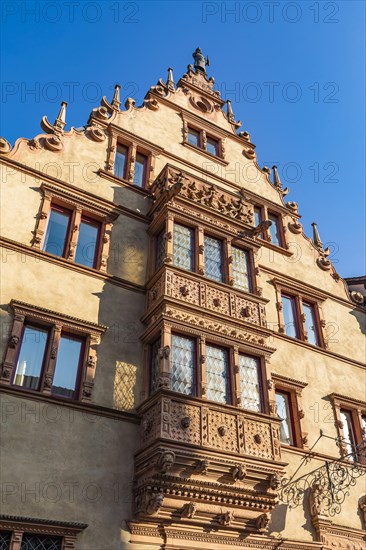 Facade of the historic La Maison des Tetes